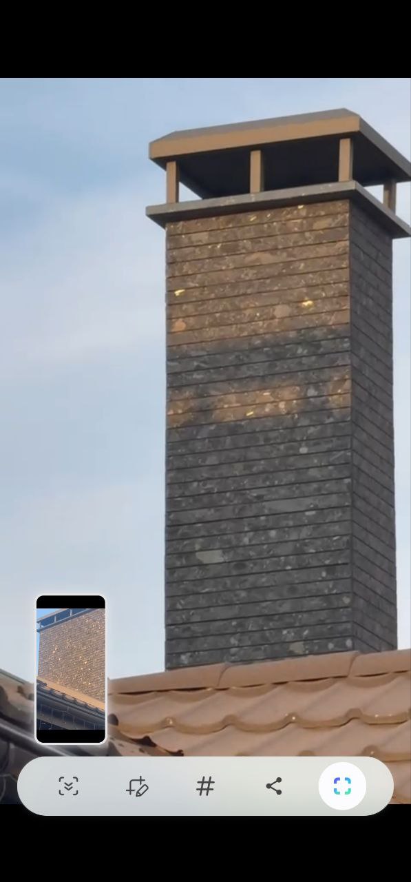 Chimney wall cladding with Black Ice L7 Labradorite