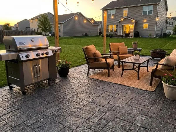 Black granite patio pavers with outdoor furniture